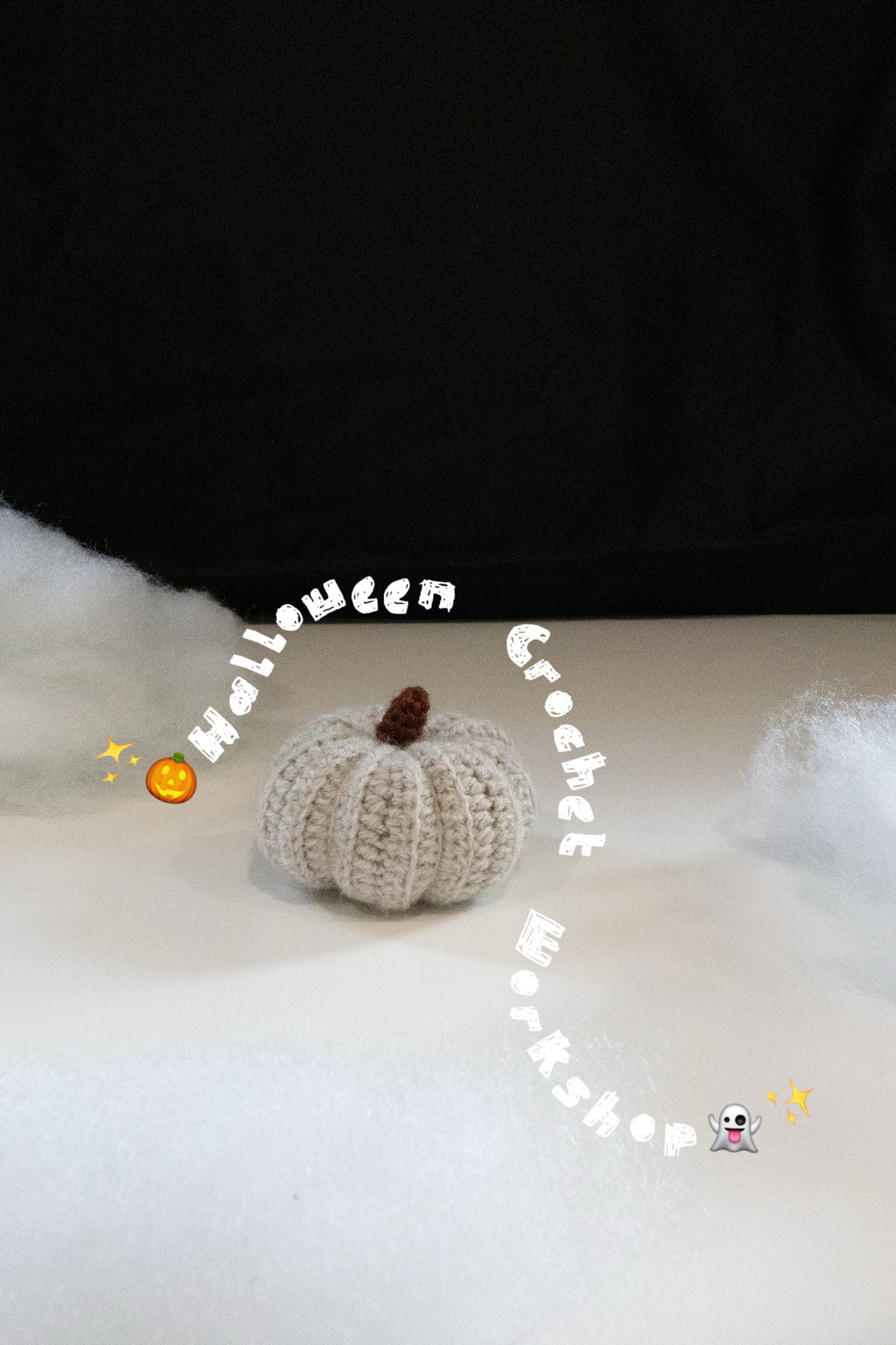 Crocheted pumpkin on a white surface with text 'Halloween Crochet Workshop' around it.
