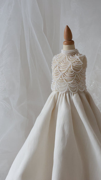 White wedding dress on a mannequin with a soft focus background